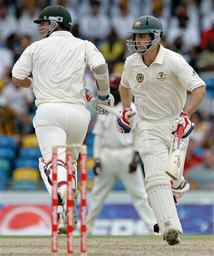 Australia's openers Simon Katich, right, and Phil Jaques run between wickets on the opening day of the third and final cricket Test match against the West Indies in Bridgetown on Thursday, June 12, 2008. 3rd Test, Australia vs West Indies, Day 1