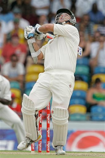 Australia's opener Phil Jaques pulls a high shot into leg side to be catch by West Indies' wicketkeeper Denesh Ramdin, unseen, for 31 runs, on the opening day of their third and final cricket Test match in Bridgetown on Thursday, June 12, 2008. 3rd Test, Australia vs West Indies, Day 1