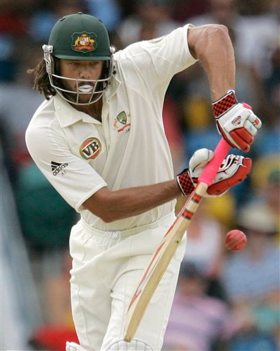 Australia's batsman Andrew Symonds drives off the bowling of West Indies' Fidel Edwards on the opening day of their third and final cricket Test match in Bridgetown on Thursday, June 12, 2008. 3rd Test, Australia vs West Indies, Day 1
