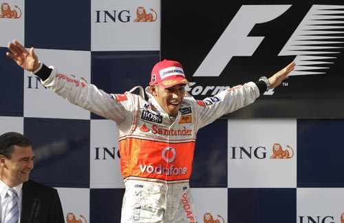 McLaren Mercedes Formula One driver Lewis Hamilton of Britain celebrates after winning the Australian Grand Prix in Melbourne on Sunday, March 16, 2008. Hamilton won the race in front of BMW Sauber Formula One driver Nick Heidfeld of Germany and Williams Formula One driver Nico Rosberg of Germany. F 1: Australian Grand Prix