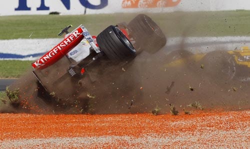 Force India Formula One driver Giancarlo Fisichella of Italy crashes at turn one at the start of the Australian Grand Prix at the Albert Park circuit in Melbourne on Sunday, March 16, 2008. F 1: Australian Grand Prix