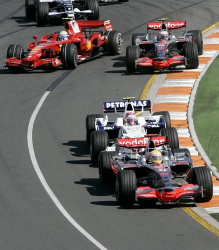 McLaren Mercedes Formula One driver Lewis Hamilton of Great Britain, front, leads the field into turn two at the start of the Australian Grand Prix at the Albert Park circuit in Melbourne on Sunday, March 16, 2008. F 1: Australian Grand Prix