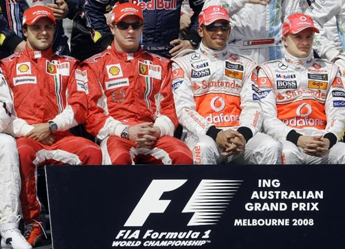 Ferrari Formula One driver Felipe Massa of Brazil, Ferrari driver Kimi Raikkonen of Finland, McLaren Mercedes driver Lewis Hamilton of Great Britain and McLaren Mercedes driver Heikki Kovalainen of Finland, from left, pose for their annual group driver's photo prior to the start of the Australian Grand Prix in Melbourne on Sunday March 16, 2008. The race is the season's opening Formula One race. F 1: Australian Grand Prix