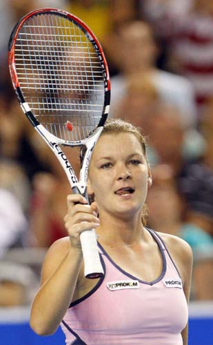 Agnieszka Radwanska of Poland celebrates after beating Svetlana Kuznetsova of Russia in a Women's singles third round match at the Australian Open tennis championships in Melbourne on Saturday, January 19, 2008. Day 6: Australian Open