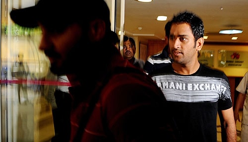 Harbhajan Singh and MS Dhoni leave the BCCI headquarters in Mumbai after an emergency session to discuss the players' refusal to sign the clause with WADA. (AFP Photo) BCCI backs players on WADA rule