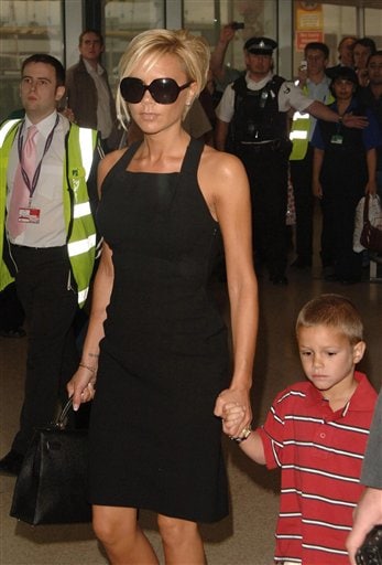 Victoria Beckham with their son Romeo. Beckhams arrive in LA
