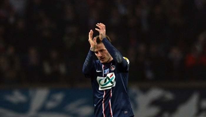 Beckham applauds the fans at the end of the French Cup match Paris Saint-Germain vs Marseille at the Parc des Princes stadium in Paris on February 27, 2013. David Beckham shows his mettle in first full-game for Paris St Germain