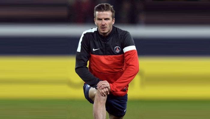 Paris Saint-Germain midfielder David Beckham warms up ahead of the French Cup match against Marseille on February 27, 2013 at the Parc des Princes stadium in Paris. David Beckham shows his mettle in first full-game for Paris St Germain