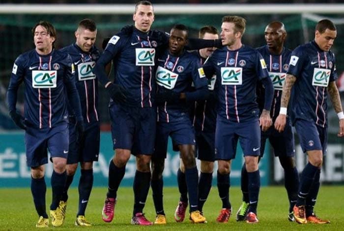 Paris St. Germain players congratulate star striker Zlatan Ibrahimovic, the tallest of the lot, after he gave the team a lead against Marseille on February 27. David Beckham shows his mettle in first full-game for Paris St Germain