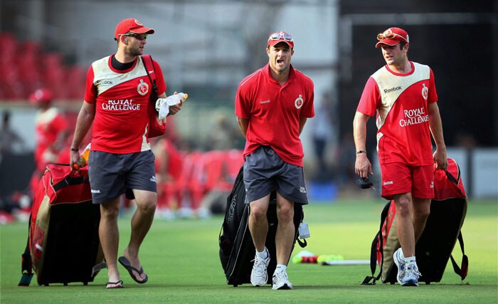 Royal Challengers Bangalore's Roelof Vander Merwe (R), Mark Boucher(C) and Dillon Du Preeze during a practice session. (PTI Image) Royal Challengers' net session
