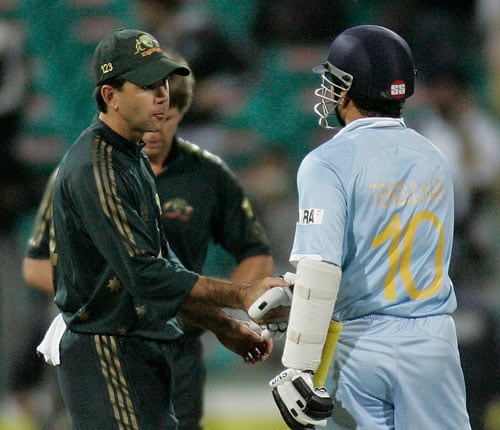 Ricky Ponting, left, congratulates Sachin Tendulkar after India won the first final of their tri-nations one-day international series in Sydney on Sunday, March 2, 2008. India won by six wickets with Tendulkar not out for 117 runs. First final - India vs Australia