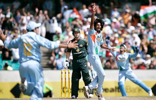 Ishant Sharma, second right, celebrates after taking the wicket of Michael Clarke, second left, for 4 runs during the first final of their tri-nations one-day international series at the Sydney Cricket Ground on Sunday, March 2, 2008. First final - India vs Australia