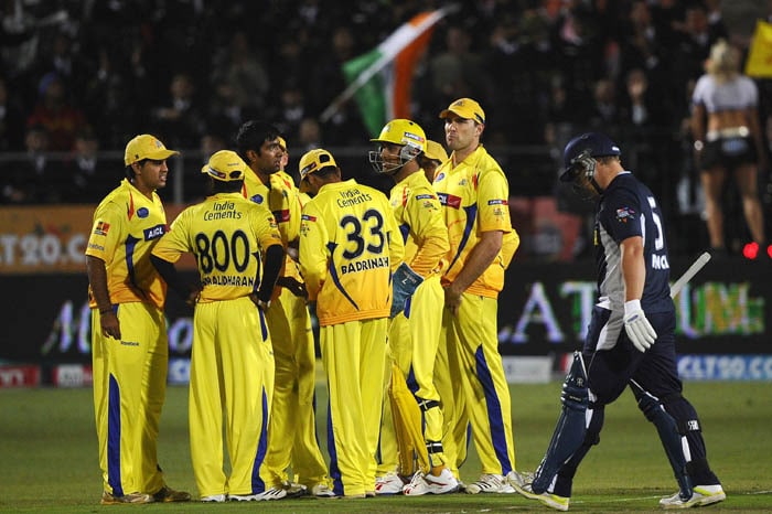 Chennai Super Kings team celebrates the dismissal of Bushrangers batsman Aaron Finch during the Champions League Twenty20 League match between Bushrangers and Chennai Super Kings at St. Georges park Stadium in Port Elizabeth. (AFP Photo) CLT20: Victoria vs Chennai