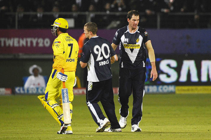 Bushrangers bowler John Hastings celebrates the dismissal of Chennai batsman and captain Mahendra Singh Dhoni during the Champions League Twenty20 League match between Bushrangers and Chennai Super Kings at St. Georges park Stadium in Port Elizabeth. (AFP Photo) CLT20: Victoria vs Chennai