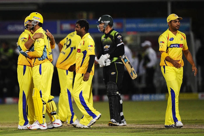 Chennai Super Kings team celebrates after winning against the Warriors at the end of the Champions League Twenty20 League match between Warriors and Chennai Super Kings at St. Georges park Stadium in Port Elizabeth. (AFP Photo) CLT20: Chennai vs Warriors