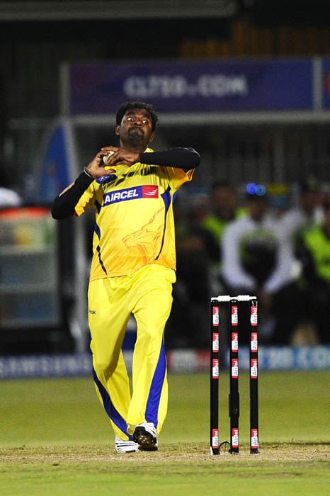 Chennai Super Kings bowler Muttiah Muralitharan bowls during the Champions League Twenty20 League match between Warriors and Chennai Super Kings at St. Georges park Stadium in Port Elizabeth. (AFP Photo) CLT20: Chennai vs Warriors