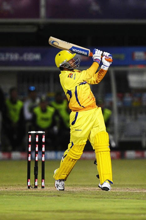Chennai Super Kings batsman and Captain Mahendra Singh Dhoni looks up after hitting a six during the Champions League Twenty20 League match between Warriors and Chennai Super Kings at St. Georges park Stadium in Port Elizabeth. (AFP Photo) CLT20: Chennai vs Warriors