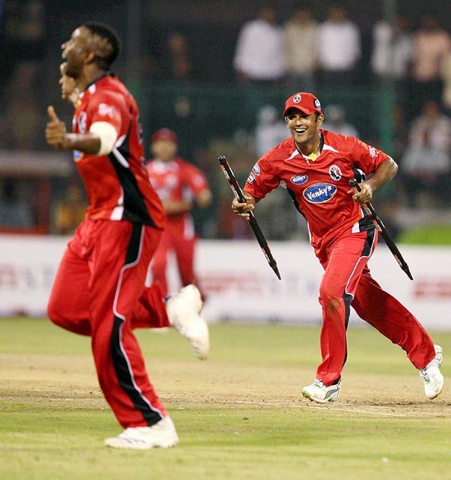 Trinidad and Tobago players celebrate their victory over Somerset during their Champions League T20 match at Chinnaswamy Stadium in Bangalore on October 12, 2009, Monday. (PTI Photo) CLT20: T&T vs Somerset
