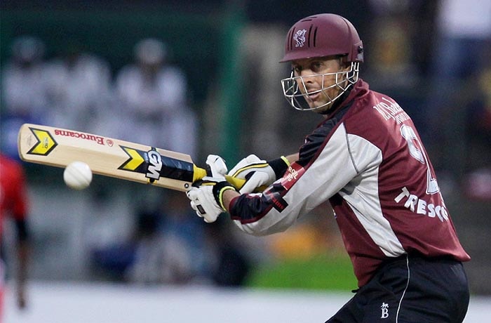 Somerset's Markus Trescothick plays a shot during the match against Trinidad and Tobago in the Champions League T20 match at Chinnaswamy Stadium in Bangalore on Monday. (PTI Photo) CLT20: T&T vs Somerset
