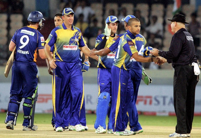 Cape Cobras celebrate after winning the Champions League Twenty20 match against Otago Volts at Rajiv Gandhi international stadium in Hyderabad on Saturday. (PTI Photo) CLT20: Cobras vs Volts
