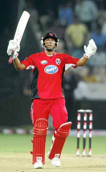Trinidad & Tobago's Daren Ganga celebrates after defeating Cape Cobras by 7 wickets in their Champions League semi-final match at Rajiv Gandhi International Cricket Stadium, Hyderabad on October 22, 2009, Thursday. CLT20 2nd semis: T&T vs Cobras