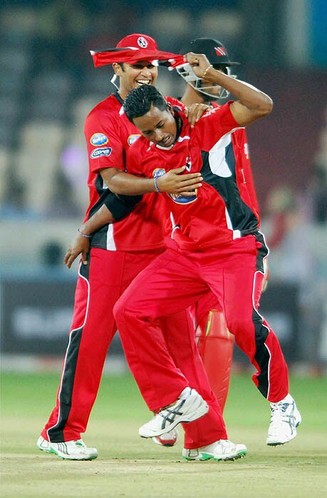 D Mohammed of Trinidad & Tobago celebrate the wicket of H Davids during the Champions League semi-final match against Cape Cobras at Rajiv Gandhi International Cricket Stadium, Hyderabad on Thursday. CLT20 2nd semis: T&T vs Cobras
