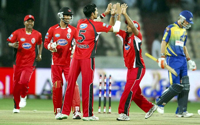 Players of the Trinidad & Tobago celebrating the wicket of AG Puttick during the Champions League semi-final match against Cape Cobras at Rajiv Gandhi International Cricket Stadium, Hyderabad on Thursday. CLT20 2nd semis: T&T vs Cobras