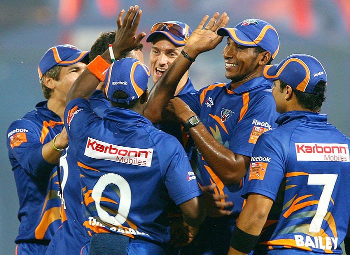 Victor Mpitsang of Diamond Eagles celebrates with teammates after taking the wicket of Sussex Sharks' during the Champions League match in New Delhi on Tuesday. (PTI Photo) CLT20: Eagles vs Sussex