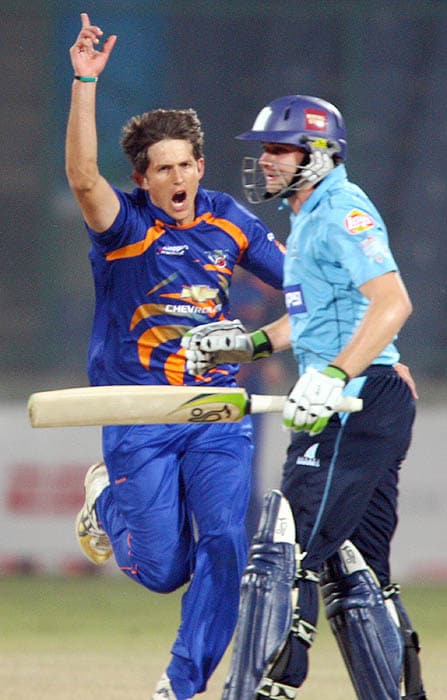 De Villiers of Diamond Eagles celebrates the wicket of Sussex Sharks' LJ Wright during the Champions League match in New Delhi on Tuesday. (PTI Photo) CLT20: Eagles vs Sussex