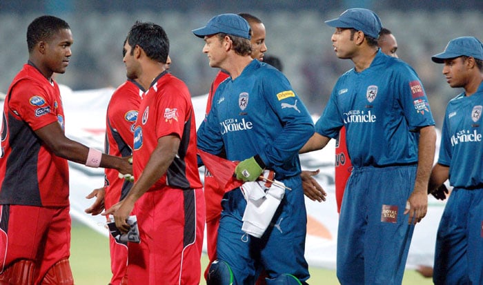 Players of Deccan Chargers and Trinidad & Tobago greet each other during their Champions League T20 match in Hyderabad. (PTI Photo) CLT20: DC vs TT