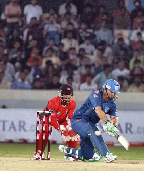 Adam Gilchrist plays a shot during their Champions League T20 match against Trinidad and Tobago in Hyderabad. (PTI Photo) CLT20: DC vs TT