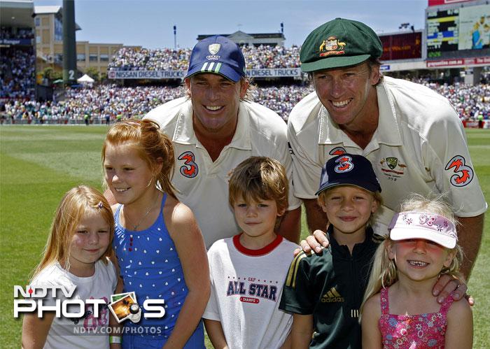 Shane Warne (rear L) with his children Summer (L), Brooke (2nd L) and Jackson (C) and McGrath (rear R) with his son James (2nd R) and daughter Holly (R).