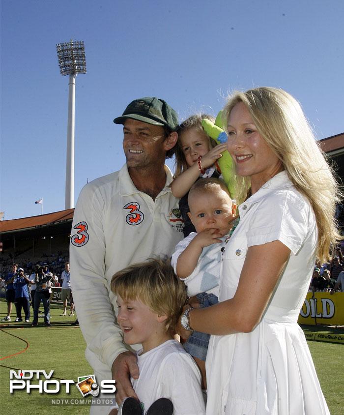 Gilchrist (L) poses with his wife Mel (R), sons Harrison (bottom) and Archie (C) and daughter Annie (C,top) after retiring from Test cricket in 2008.