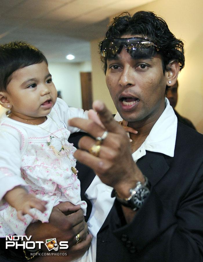 Sri Lankan cricketer Thillakeratne Dilshan with his son in this picture clicked in 2009.