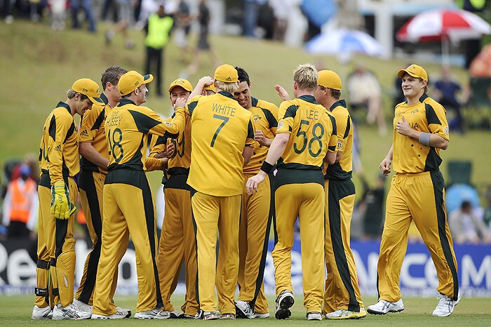 Australian team celebrates the dismissal of Pakistan's Shahid Afridi during their ICC Champions Trophy match on Wednesday at SuperSport Park in Centurion. (AFP Photo) CT: Aus vs Pak, Match 11