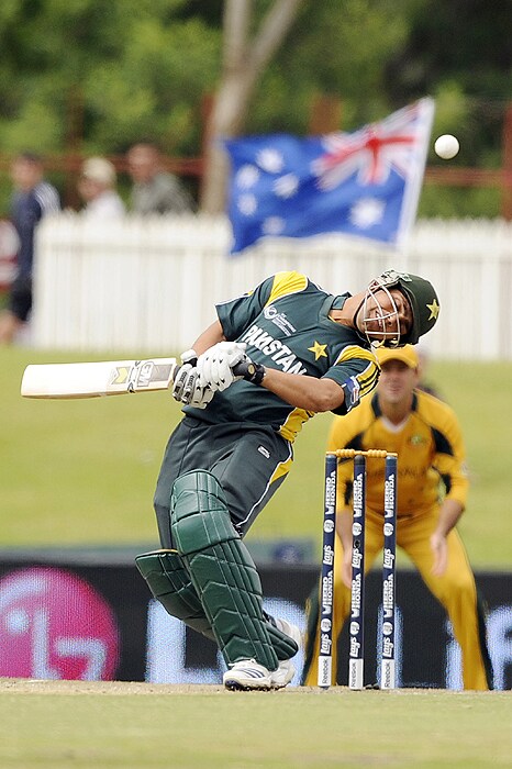 Pakistan's Kamran Akmal ducks his head to avoid a bounce during their Champions Trophy match against Australia on Wednesday at SuperSport Park in Centurion. (AFP Photo) CT: Aus vs Pak, Match 11