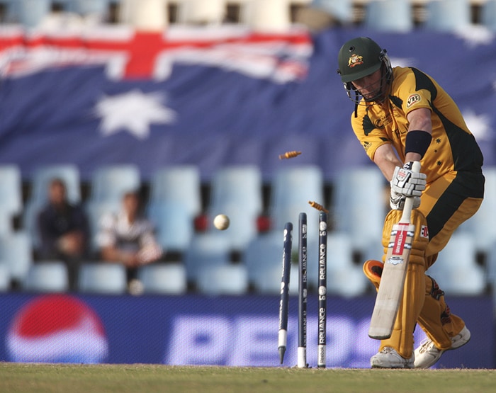 Australia's Cameron White is bowled out by Pakistan's Mohammad Asif during their Champions Trophy match against Pakistan at Centurion on Wednesday. (AP Photo) CT: Aus vs Pak, Match 11