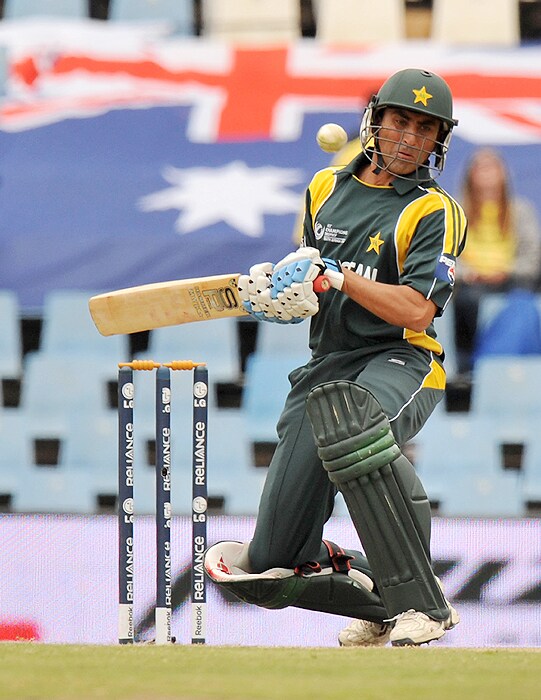 Pakistan's Younus Khan avoids a bouncer from Australia's James Hopes during their Champions Trophy match against Australia on Wednesday at SuperSport Park in Centurion. (AFP Photo) CT: Aus vs Pak, Match 11