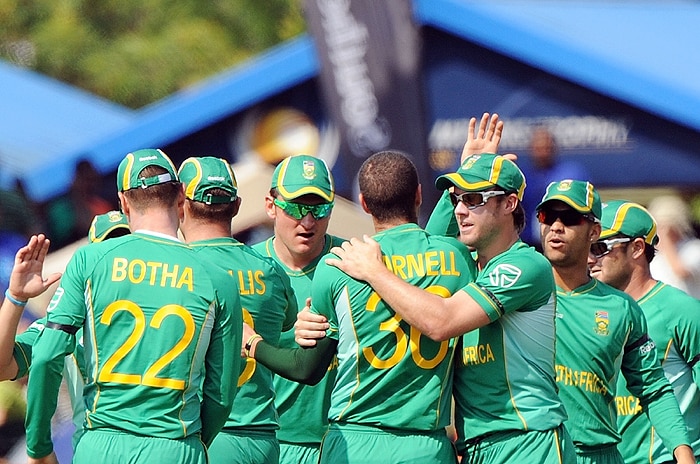 South Africa's cricketers celebrate the wicket of New Zealand's Jesse Ryder during their ICC Champions Trophy group match at Supersport Park in Centurion on Thursday. (AFP Photo) CT: SA vs NZ, Match 3