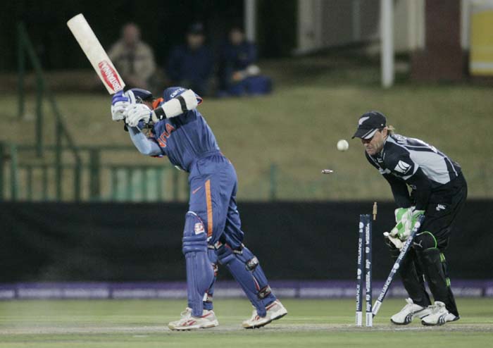 New Zealand wicketkeeper Brendon McCullum react as India's Rahul Dravid is bowled out during a warm up match between India and New Zealand ahead of the Champions Trophy at Potchefstroom. (AP Photo) CT: Ind vs NZ warm-up tie
