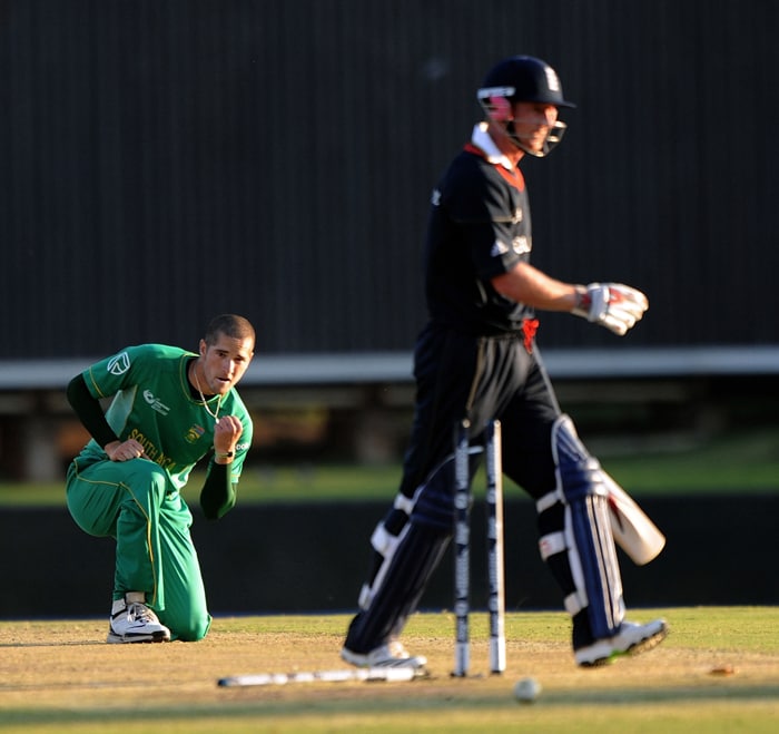 Wayne Parnell celebrates the wicket of Paul Collingwood during the ICC Champions Trophy match between England and South Africa in Centurion. (AFP Photo) CT: Eng vs SA, Match 8