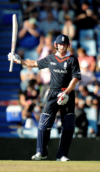 Paul Collingwood raises his bat as he celebrates his half-century during the ICC Champions Trophy match between England and South Africa in Centurion. (AFP Photo) CT: Eng vs SA, Match 8
