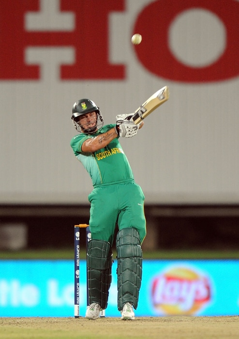 Herschelle Gibbs hits a six during the ICC Champions Trophy match between England and South Africa in Centurion. (AFP Photo) CT: Eng vs SA, Match 8
