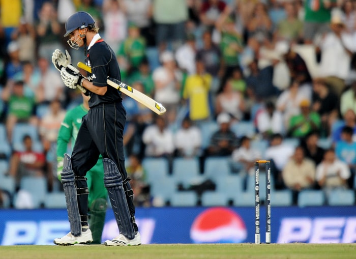 Stuart Broad leaves the field after being clean bowled by Wayne Parnell during the ICC Champions Trophy match between England and South Africa in Centurion. (AFP Photo) CT: Eng vs SA, Match 8