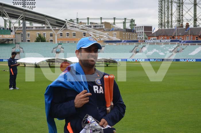 MS Dhoni looks relaxed after a good stint in training. ICC Champions Trophy: Team India gear up for clash against West Indies