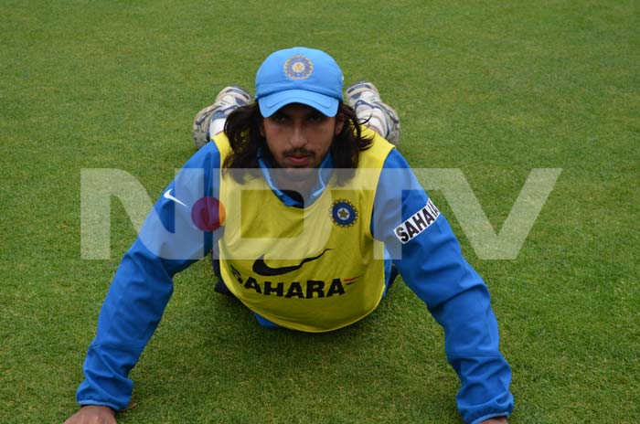 Ishant does a stretch during training. ICC Champions Trophy: Team India gear up for clash against West Indies