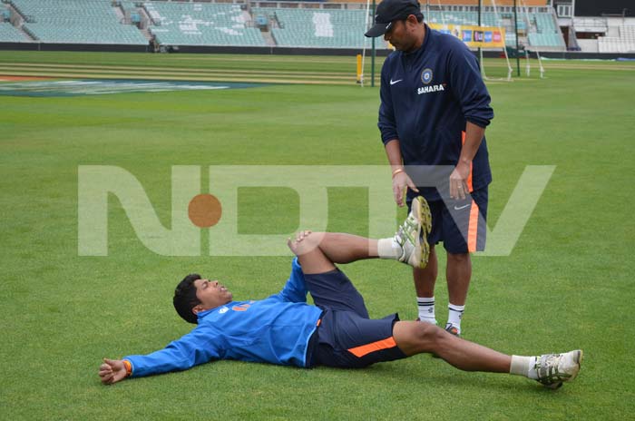 Umesh does a stretch to relax the muscles before bowling. ICC Champions Trophy: Team India gear up for clash against West Indies