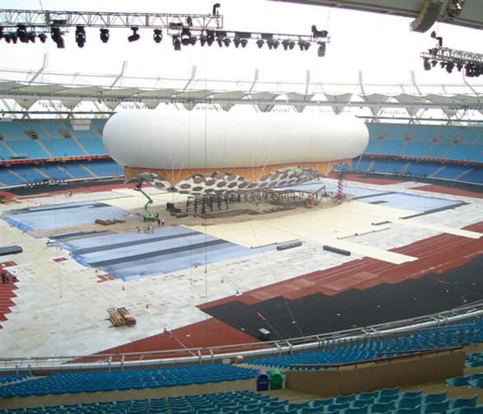 Hard at work to make the opening ceremony a grand success. It should be - that balloon alone cost Rs 50 crore. (NDTV Photo)