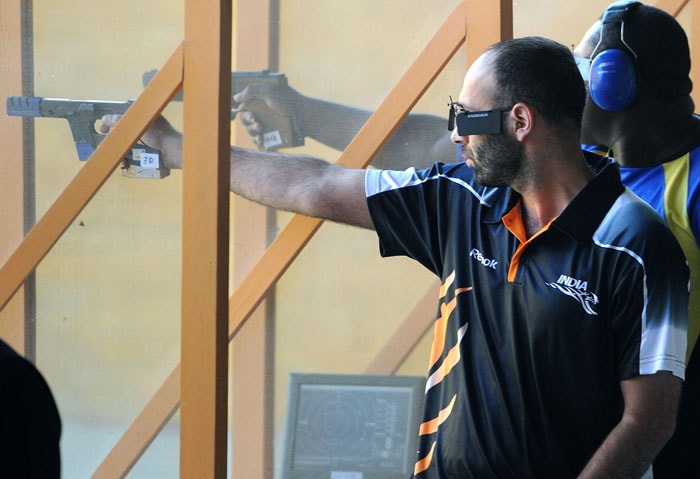 India's Harpreet Singh competes in the men's singles 10 m centrefire pistol event of the XIX Commonwealth Games at the Karni Singh Shooting Range in New Delhi. Singh won the gold medal. (AFP Photo)