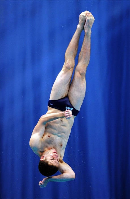 Oliver Dingley of England competes in the preliminary round of Men's 1m Springboard Diving at the Dr. SP Mukherjee Aquatics Complex in New Delhi. (AFP Photo)